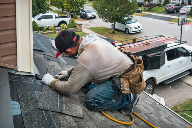 Professional Roof Repair technician working in Buckland, MA